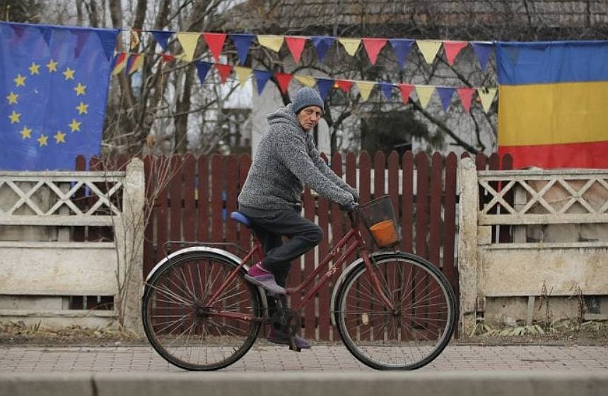 man riding bike in Romania